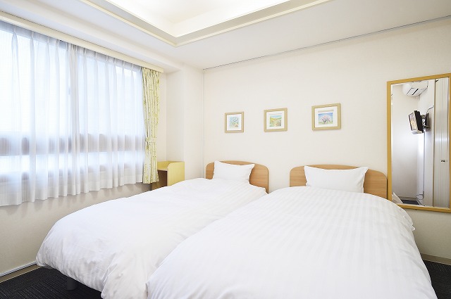 主寝室・ベッド2台